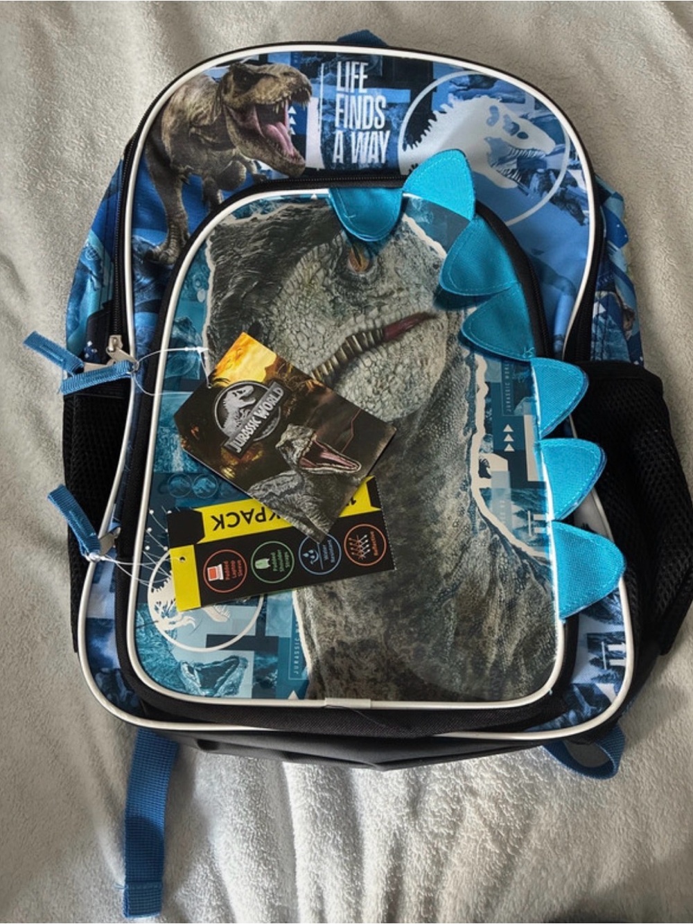 Jurassic World Kids Blue Dinosaur Backpack with Playful Spike Accents